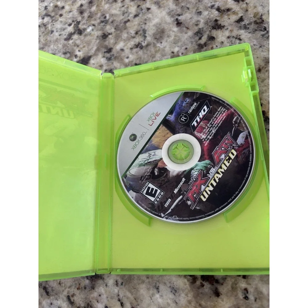 Two Xbox 360 race games need for‎ speed, hot pursuit, and MX versus ATV untamed